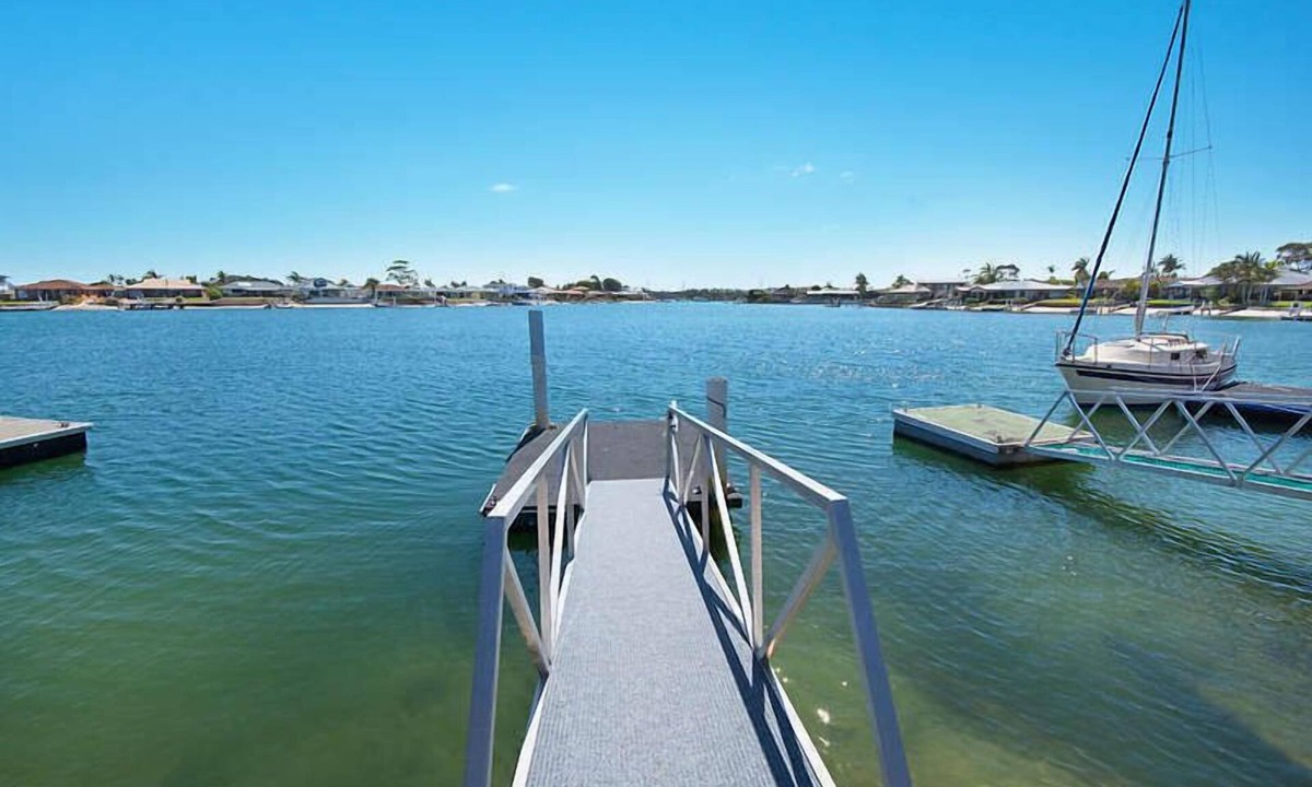 Yamba House | 21 MELALEUCA DRIVE, Waterfront with private boat ramp and pontoon -Pet Friendly