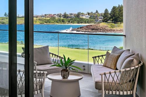 Kiama Apartment | 3BR Coastal Escape with Ocean Views, Shared Pool & Jacuzzi, 2 Car Spaces & Walk to Surf Beach