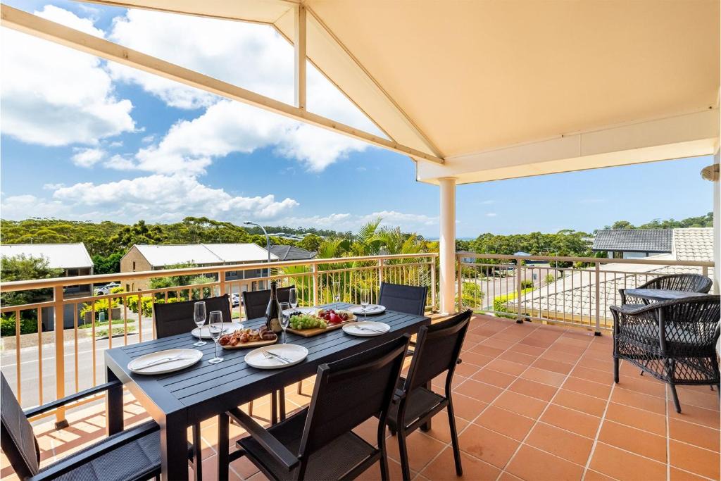 Corlette House | 74A Sergeant Baker Drive comfortable duplex with beautiful distant water views