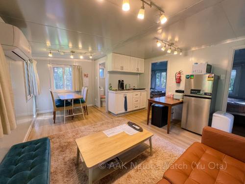 Malanda House | AAK cabin - standalone riverfront cabin