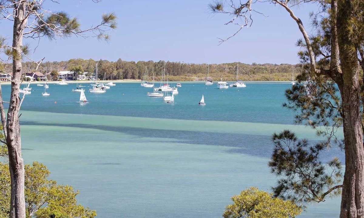 Corlette House | Corlette Waterfront, 2/44 Danalene Parade - Waterfront Luxury, WIFI, Aircon, Boat Parking