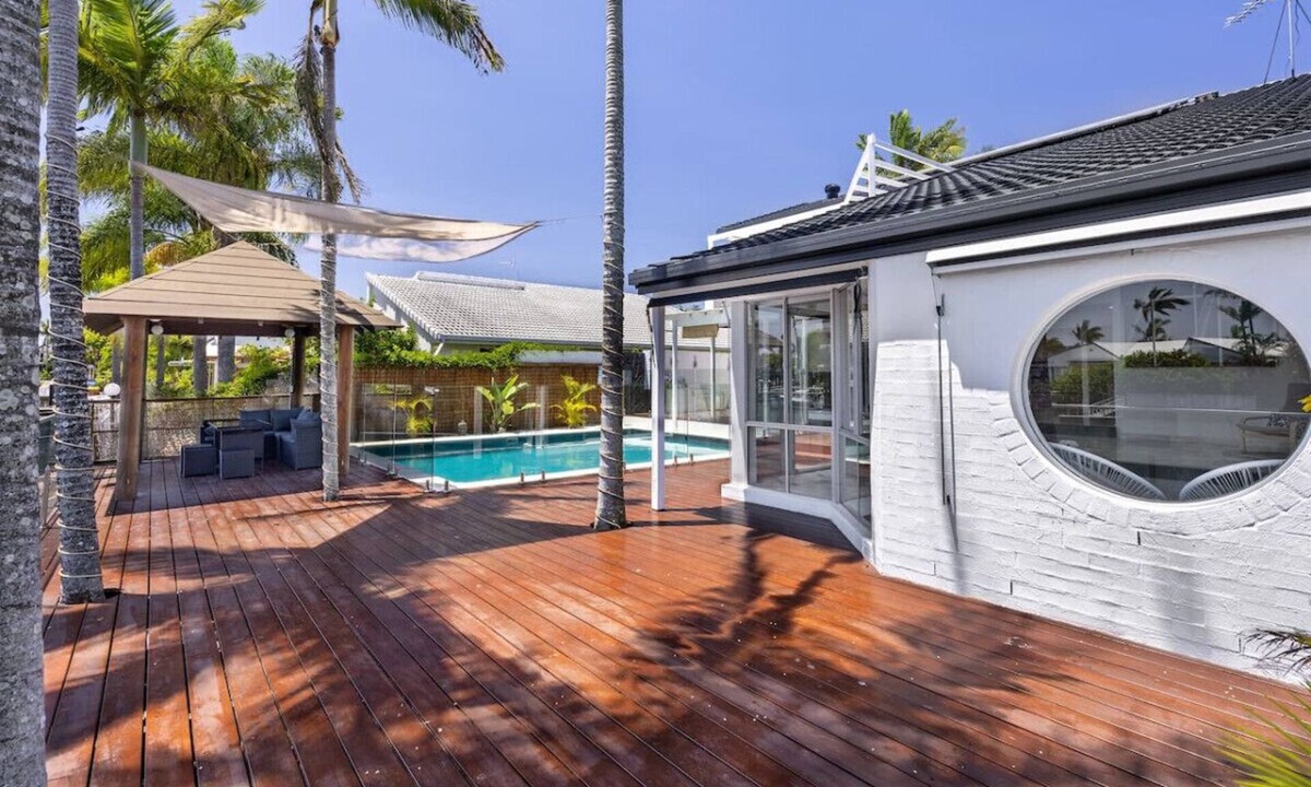 Runaway Bay House | Harborview Bliss: 4BR Coastal Retreat w/Pool