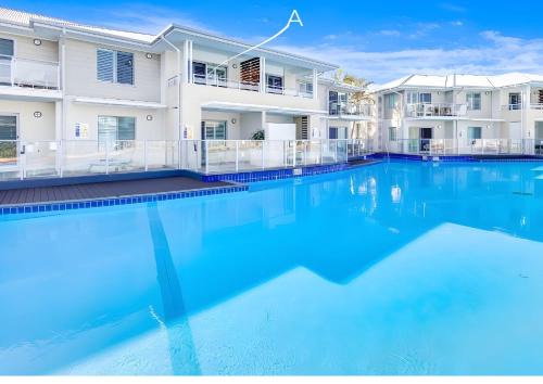 Salamander Bay Apartment | Oaks Pacific Blue Resort One Bedroom Lagoon Spa Aparment