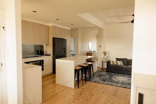 Tighes Hill House | Pet-Friendly 3BR Home with Workspace & Creek Views