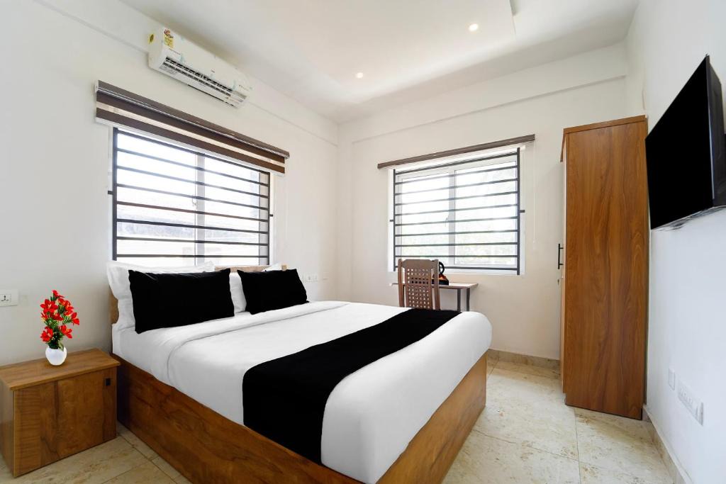 Kozhikode Hotel | Super Collection O Malabar Botanical Garden Formerly Meelad Homes