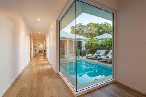 Trinity Beach House | Trinity Beach Coastal Luxe Pool Retreat – 4BR