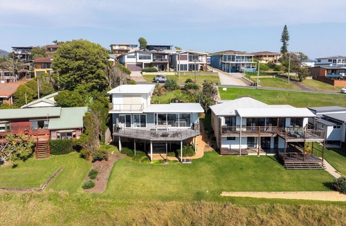 Scotts Head House | Absolute waterfront beach house with massive deck - family and dog friendly