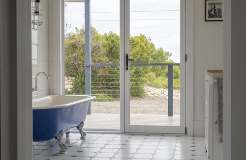 Pelican Lagoon House | Allure Beach Retreat - Privacy, Nature, Direct Beach Access