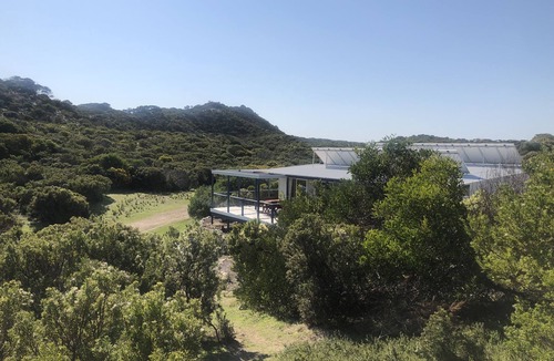Pelican Lagoon House | Allure Beach Retreat - Privacy, Nature, Direct Beach Access