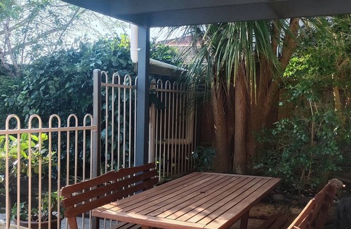 Kiama Apartment | Beautiful eclectic studio with lush private garden and solar heated pool