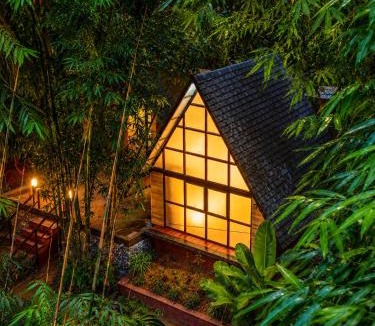 Virajpet Resort | Cave Ritz Coorg by VOYE HOMES - Cottages with Guided Plantation walks and Treks - Pet Friendly