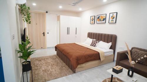 Sushant Lok Apartment | Central suites with Terrace by Luxury Heights