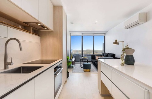 Moonee Ponds Apartment | Chic 1-Bed with City Views, Parking, Gym & Pool