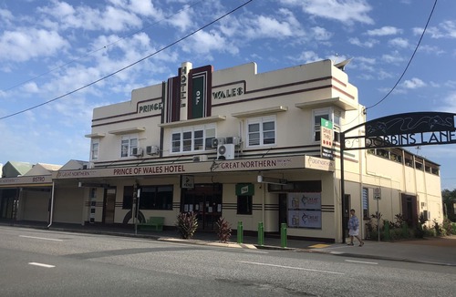 Proserpine Apartment | Clean tidy hotel room with a shared kitchen and shower area