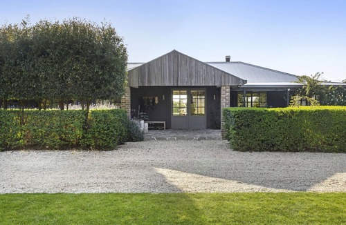 Boneo House | Elevated Oasis with Bay Views