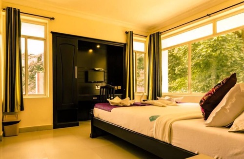 Munnar Hotel | HOTEL EMERALD INN