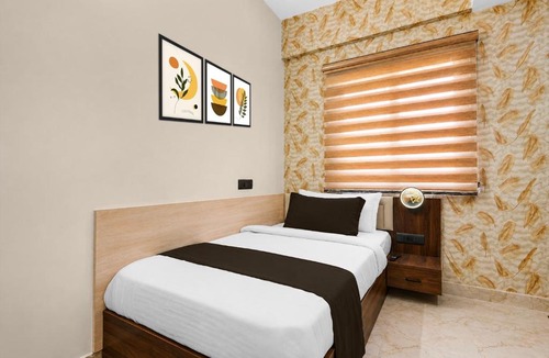 Palm Meadows Hotel | Hotel O Teja Luxe Suites