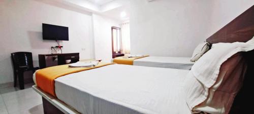 Hampankatta Hotel | Hotel White Stone Premier Inn