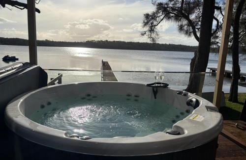 Erowal Bay House | Jerrinja - Absolute waterfront with jetty - 5 mins to Hyams Beach