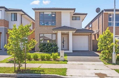 Austral House | KozyGuru | Austral | Charming 4Bedroom Family Home