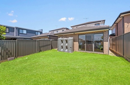 Austral House | KozyGuru | Austral | Charming 4Bedroom Family Home