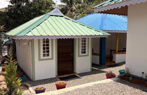 Kumily House | LES COTTAGES de Suryatrips Homely Stay