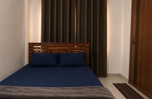 Kozhikode House | lQ Rooms