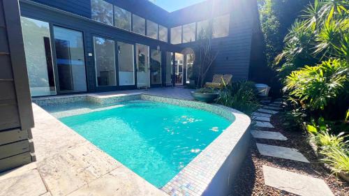 Pearl Beach House | Luxury Pearl Beach House with Private Heated Mineral Pool, Yoga Deck & Fire Pit