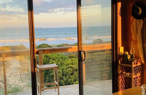 Dolphin Sands House | Mid-century beach house on five private acres, dogs welcome