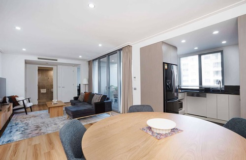 City East Apartment | Modern 1-Bed Unit with Pool Views and Balcony