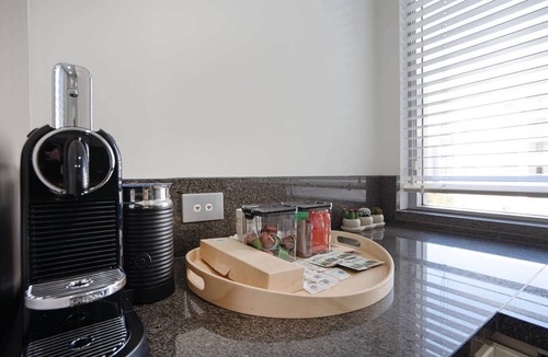 City East Apartment | Modern 1-Bed Unit with Pool Views and Balcony