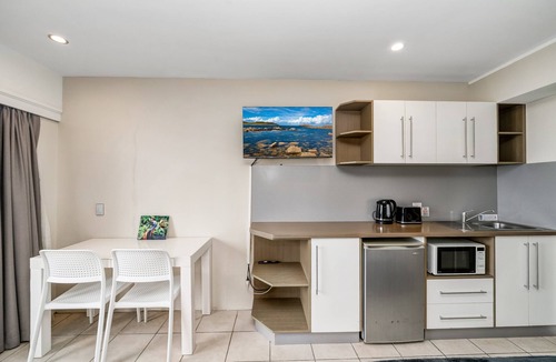 North Ward Apartment | Oceanfront Strand Escape Stunning views pool