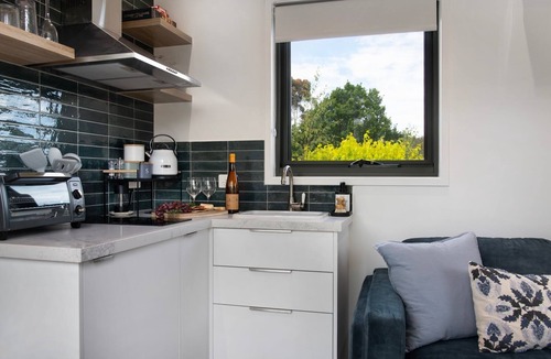Hepburn House | Piccola Blu is a tiny retreat designed for stillness, cosy corners and whispering garden