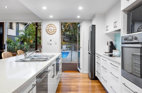 Alexandra Headland House | Pool side Luxury, pet friendly - walk to the beach