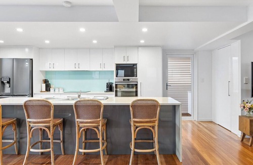 Alexandra Headland House | Pool side Luxury, pet friendly - walk to the beach
