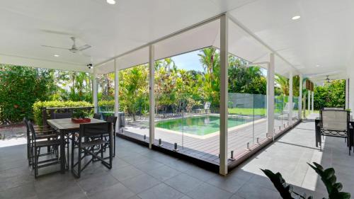Trinity Beach House | Poolside Palms Villa