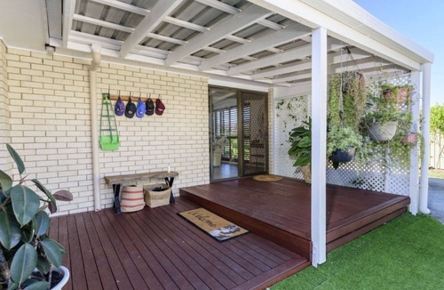 Sandstone Point House | Relax & Unwind: Poolside Paradise