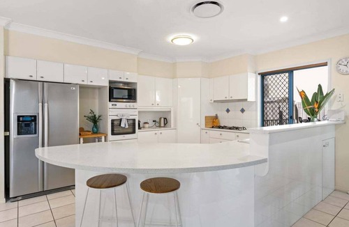 Banksia Beach House | Relaxation & Space in a Canal Home