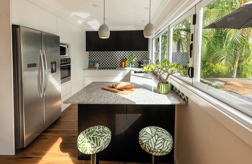Dunbogan Cottage | Stunning River front Cottage with pool