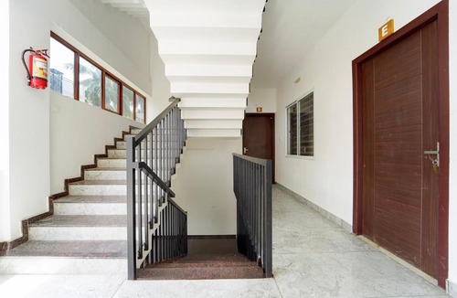Kozhikode Hotel | Super Collection O Malabar Botanical Garden Formerly Meelad Homes