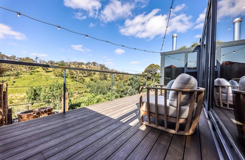 Hepburn Cottage | Teetering over a ravine, with a petrified stone bath older than the dinosaurs