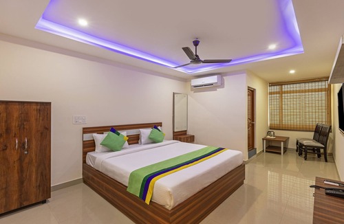 Bengaluru Hotel | Treebo Nandi Comforts, Peenya
