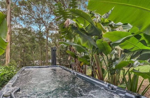 Murrays Beach House | Wallarah Forest Stay - heated swim spa