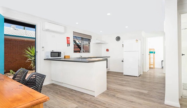 2 Bedroom Unit Central, 5 minutes walk to pristine beaches! Newly renovated