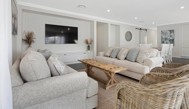 4 bedroom Hampton style home with theatre room. Close to CBD and beaches