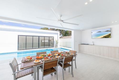 57 Tomaree Road Complex - House and Cabana with Pool, Linen, Air-con, Wi-fi, Boat Parking