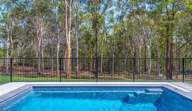 A tranquil bushland retreat with KB, Ducted AC and access to a heated pool.