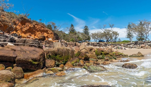 Comfortable 2BR coastal unit with WiFi, BBQ area, parking & linen included, close to beach