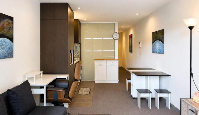 Compact Stay with Balcony, Rooftop & Gym
