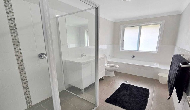 Cosy three bedroom home, two bathrooms and BBQ area!